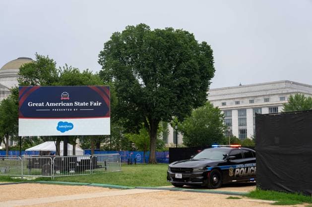 July 10, 2026, Washington, District Of Columbia, USA: Despite the heat, humidity, and rain, tourists and locals gathered on the National Mall for the final day of the Great American State Fair. Police and the National Guard were on scene to help direct crowds and keep the peace. Washington USA  - ZUMAh210 20260710_znp_h210_011 Copyright: xDavidxHansenx