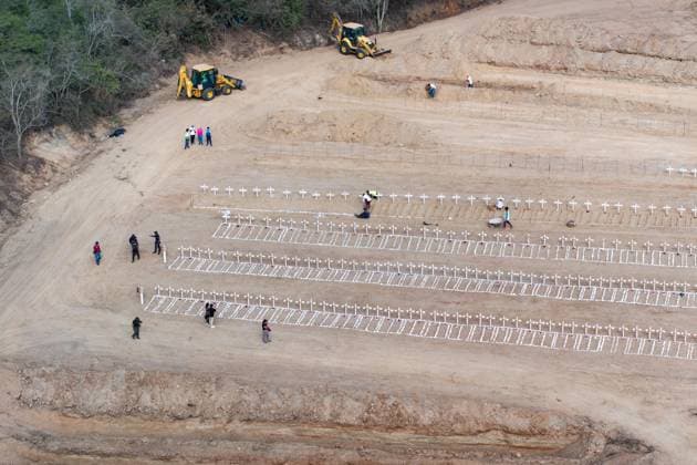 Emergency cemetery opens in Venezuela after deadly earthquakes LA GUAIRA, VENEZUELA - JULY 10: An aerial view of the mass grave at the La Esperanza Cemetery located along the highway connecting Catia La Mar and Carayaca, as it was opened under emergency measures following the June 24 earthquakes to bury the bodies of hundreds of people whose relatives could not be reached, in La Guaira, Venezuela on July 10, 2026. Alongside identified victims, hundreds of unidentified bodies were also laid to rest at the cemetery. Cem Tekkesinoglu Anadolu La Guaira Venezuela. Editorial use only. Please get in touch for any other usage.  Copyright: x2026xAnadoluxCemxTekkesinoglux