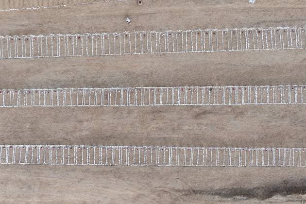 Emergency cemetery opens in Venezuela after deadly earthquakes LA GUAIRA, VENEZUELA - JULY 10: An aerial view of the mass grave at the La Esperanza Cemetery located along the highway connecting Catia La Mar and Carayaca, as it was opened under emergency measures following the June 24 earthquakes to bury the bodies of hundreds of people whose relatives could not be reached, in La Guaira, Venezuela on July 10, 2026. Alongside identified victims, hundreds of unidentified bodies were also laid to rest at the cemetery. Cem Tekkesinoglu Anadolu La Guaira Venezuela. Editorial use only. Please get in touch for any other usage.  Copyright: x2026xAnadoluxCemxTekkesinoglux