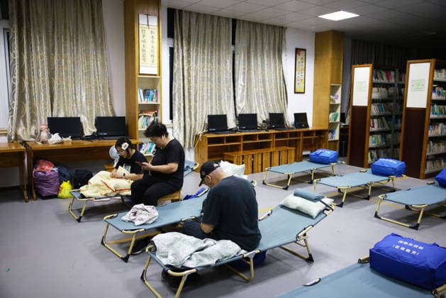 CANGNAN, CHINA - JULY 10: Residents gather at a shelter to take shelter from Typhoon Bavi on July 10, 2026 in Cangnan County, Wenzhou City, Zhejiang Province of China. China s State Flood Control and Drought Relief Headquarters on July 10 raised its emergency response for flood control and typhoon prevention in Zhejiang and Fujian provinces from Level III to Level II.  Copyright: xChinaxNewsxServicex 111653560528