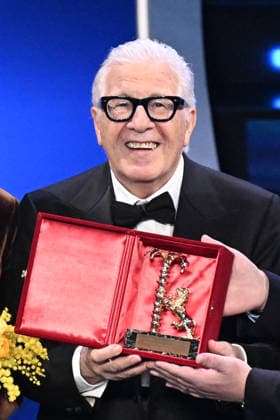 February 10, 2023, Sanremo, Rome, Italy: February 10, 2023, Sanremo. 73rd Italian Song Festival, fourth night. Pictured is Peppino di Capri with the Lifetime Achievement Award. Sanremo Italy  - ZUMAa289 20230210_zia_a289_003 Copyright: xMariaxLauraxAntonellix