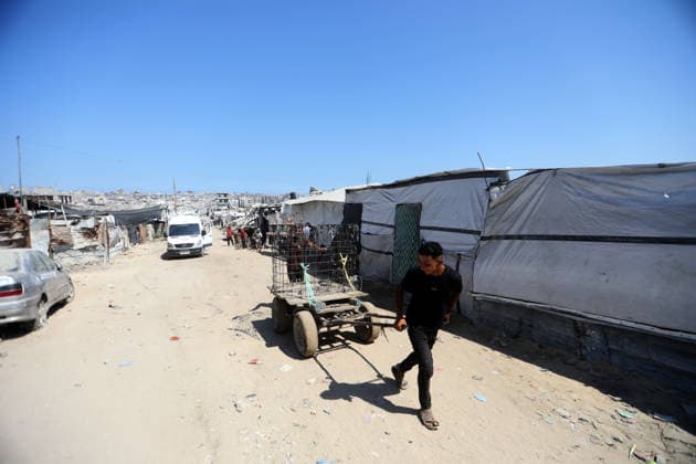 Displaced Palestinians endure harsh living conditions in eastern Gaza City Displaced Palestinians struggle to continue their daily lives inside worn-out tents erected near buildings destroyed by the war in the al-Zarqa area, east of Gaza City, on July 11, 2026. The scene coincides with World Population Day as displaced families continue to face shortages of water and food, deteriorating sanitation and healthcare services, and the widespread collapse of essential infrastructure amid the ongoing impact of the war. Photo by Bilal Osama apaimages Gaza city Gaza Strip Palestinian Territory 110726_Gaza_BO_00(53) Copyright: xapaimagesxBilalxOsamax xapaimagesx