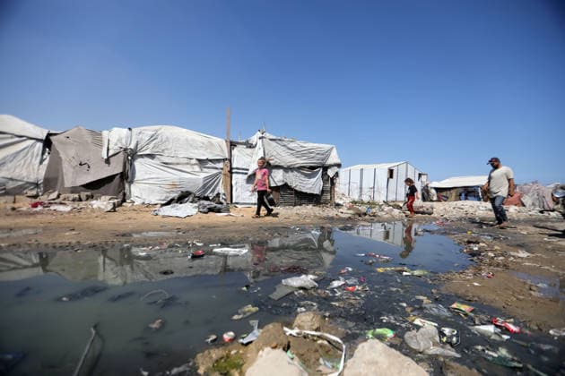 Displaced Palestinians endure harsh living conditions in eastern Gaza City Displaced Palestinians struggle to continue their daily lives inside worn-out tents erected near buildings destroyed by the war in the al-Zarqa area, east of Gaza City, on July 11, 2026. The scene coincides with World Population Day as displaced families continue to face shortages of water and food, deteriorating sanitation and healthcare services, and the widespread collapse of essential infrastructure amid the ongoing impact of the war. Photo by Bilal Osama apaimages Gaza city Gaza Strip Palestinian Territory 110726_Gaza_BO_00(12) Copyright: xapaimagesxBilalxOsamax xapaimagesx