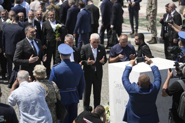 Thousands gather in Srebrenica to mark 31st anniversary of genocide as 10 more victims laid to rest POTOCARI, BOSNIA AND HERZEGOVINA – JULY 11: Delegations pay tribute at the memorial monument at the entrance of the Potocari Memorial Cemetery during a ceremony marking the 31st anniversary of the 1995 Srebrenica genocide in Potocari, Bosnia and Herzegovina, on July 11, 2026. The commemoration, attended by thousands of mourners, survivors, foreign dignitaries and religious leaders, coincided with the collective funeral of 10 newly identified genocide victims. The genocide, carried out by Bosnian Serb forces, claimed the lives of more than 8,000 Bosniak men and boys. Samir Jordamovic Anadolu Potocari Bosnia and Herzegovina. Editorial use onl  Copyright: x2026xAnadoluxSamirxJordamovicx