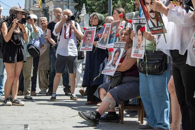 July 11, 2026, Istanbul, Istanbul, Turkey: Members of the Saturday Mothers People, relatives of victims of enforced disappearances, human rights defenders and supporters gather for the 1111th weekly vigil at Galatasaray Square in central Istanbul. Holding photographs of their missing relatives and carnations, participants demand truth, justice and accountability for those who disappeared in custody, calling on the authorities to conduct effective investigations into unresolved enforced disappearance cases. Istanbul Turkey  - ZUMAt171 20260711_zip_t171_012 Copyright: xAbdullahxTepelix