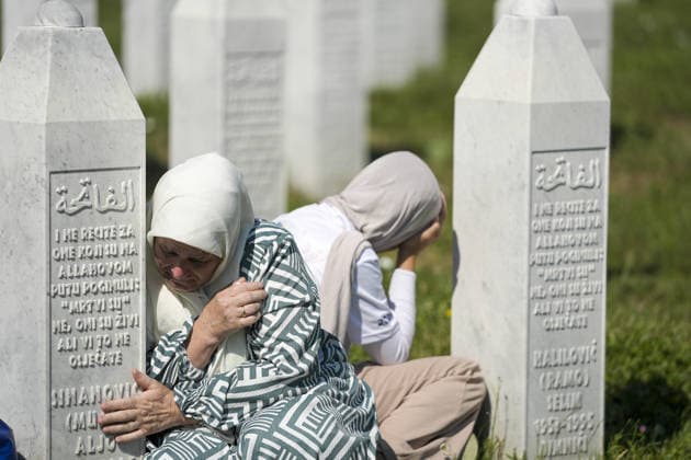 Thousands gather in Srebrenica to mark 31st anniversary of genocide as 10 more victims laid to rest POTOCARI, BOSNIA AND HERZEGOVINA - JULY 11: Relatives of victims of the 1995 Srebrenica genocide pray at the graves of their loved ones at the Potocari Memorial Cemetery in Potocari, Bosnia and Herzegovina, on July 11, 2026. Thousands of mourners, survivors, foreign dignitaries and religious leaders gathered Saturday at the Srebrenica-Potocari Memorial Center to mark the 31st anniversary of the Srebrenica genocide as the remains of 10 newly identified victims were laid to rest. The collective funeral, held every July 11, remains one of Bosnia and Herzegovina’s most solemn commemorations, as families continue burying loved ones whose remains a  Copyright: x2026xAnadoluxSamirxJordamovicx