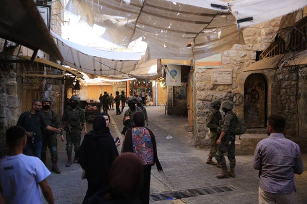 Israeli soldiers deploy during settler incursion in Hebron Israeli soldiers deploy in the Old City of Hebron, in the West Bank, to secure an incursion by Israeli settlers into the area, on July 11, 2026. Israeli forces imposed restrictions on the movement of Palestinians and shop owners around the Old City during the incursion. Photo by Mamoun Wazwaz apaimages Hebron West Bank Palestinian Territory 110726_Hebron_MW_00(36) Copyright: xapaimagesxMamounxWazwazx xapaimagesx