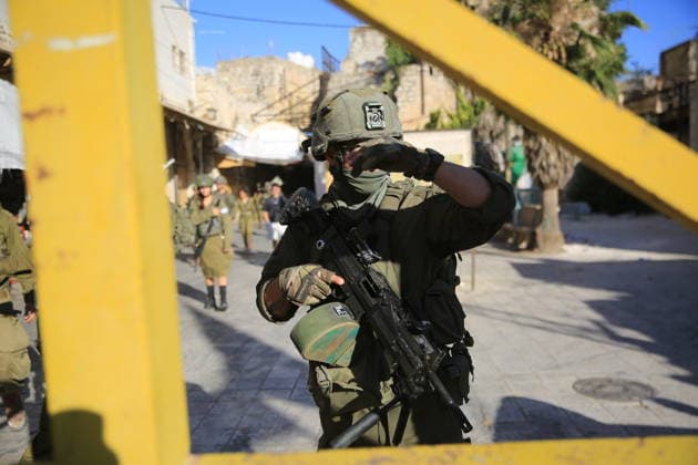 Israeli soldiers deploy during settler incursion in Hebron Israeli soldiers deploy in the Old City of Hebron, in the West Bank, to secure an incursion by Israeli settlers into the area, on July 11, 2026. Israeli forces imposed restrictions on the movement of Palestinians and shop owners around the Old City during the incursion. Photo by Mamoun Wazwaz apaimages Hebron West Bank Palestinian Territory 110726_Hebron_MW_00(40) Copyright: xapaimagesxMamounxWazwazx xapaimagesx