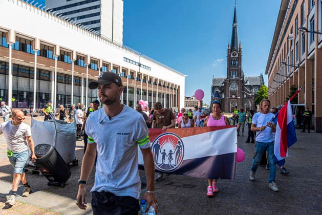 July 11, 2026, Schiedam, South Holland, Netherlands: 11 July 2026. Anti-asylum seeker center demonstrators march. In Schiedam, the Netherlands, a pro-asylum seeker demonstration promoted by Extinction Rebellion countered a demonstration called the Vrouwenmars tegen het AZC (Women s March Against the AZC) promoted by anti-asylum seeker centre groups. Both events took place in the center of Schiedam. Schiedam Netherlands - ZUMAp202 20260711_zip_p202_014 Copyright: xJamesxPetermeierx