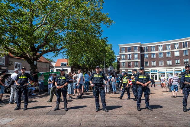 July 11, 2026, Schiedam, South Holland, Netherlands: 11 July 2026. In Schiedam, the Netherlands, a pro-asylum seeker demonstration promoted by Extinction Rebellion countered a demonstration called the Vrouwenmars tegen het AZC (Women s March Against the AZC) promoted by anti-asylum seeker centre groups. Both events took place in the center of Schiedam. Schiedam Netherlands - ZUMAp202 20260711_zip_p202_018 Copyright: xJamesxPetermeierx