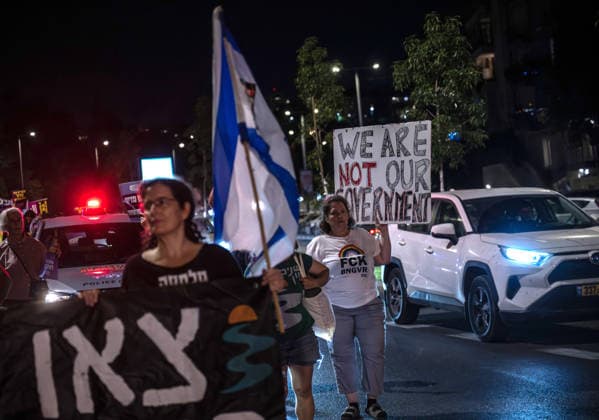 Anti-government demonstrators gather in West Jerusalem JERUSALEM - JULY 11: Protesters hold anti-government placards and wave Israeli flags during a demonstration against Israeli Prime Minister Benjamin Netanyahu and his government in West Jerusalem on July 11, 2026. Demonstrators called for an end to the ongoing military attacks on Gaza and Lebanon. Mostafa Alkharouf Anadolu Jerusalem Israel. Editorial use only. Please get in touch for any other usage.  Copyright: x2026xAnadoluxMostafaxAlkharoufx