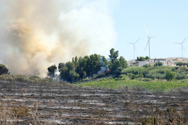 Wildfires continue on the Italian island of Sicily PALERMO, ITALY - JULY 11: Smoke rises after a wildfire that breaks out in a maquis-shrubland area near the Partinico municipality of Palermo in Sicily, Italy on July 11, 2026. Firefighting teams intervened with ground crews, water-discharging aircraft, and helicopters to bring the blaze under control Alberto Lo Bianco Anadolu Sicily Italy. Editorial use only. Please get in touch for any other usage.  Copyright: x2026xAnadoluxAlbertoxLoxBiancox