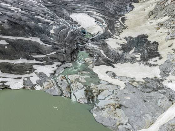 Drohnenaufnahme des schmelzenden Rhonegletschers, Gletschersee, Ursprung der Rhone, Schweiz Drone shot of melting Rhone glacier, glacial lake, origin of Rhone river, Switzerland Copyright: imageBROKER AndreasxWerth ibxawe18368903.jpg