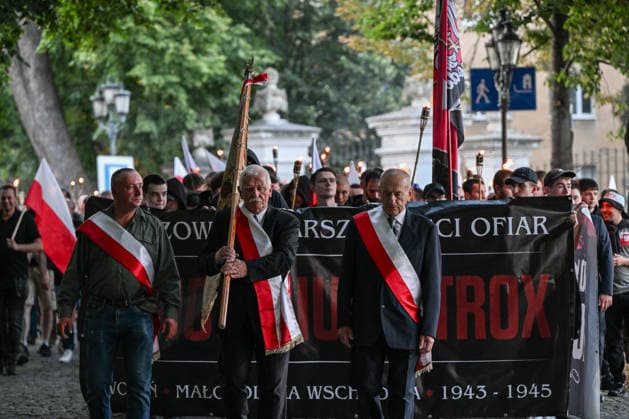Poland Commemorates 83rd Anniversary Of Volhynia Genocide RZESZOW, POLAND - JULY 11: Senior attendees wearing red and white sashes lead the frontline of the silent march holding a banner reading March in Memory of Victims of Genocidium Atrox (Latin for Savage Genocide) during a solemn commemoration on July 11, 2026, in Rzeszow, Poland. The commemorative march, organized by far-right and nationalist organizations including Oboz Narodowo-Radykalny (ONR), marks the 83rd anniversary of Bloody Sunday to honor over 100,000 Polish civilians tortured and murdered by the Ukrainian Insurgent Army (UPA) and the Organization of Ukrainian Nationalists (OUN-B) across Volhynia and Eastern Galicia between 1943 and 1947. Rzeszow Poland  Copyright: xArturxWidakx originalFilename: widak-polandma260711_npVft.jpg