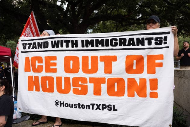 July 11, 2026, Houston, Texas, USA: Protesters hold up a sign at Houston City Hall to protest against U.S. Immigration and Customs Enforcement (ICE) after Lorenzo Salgado Araujo was fatally shot by an ICE agent during an attempted immigration enforcement operation, an incident that has prompted calls from community leaders and elected officials for an independent investigation, Saturday, July 11, in Houston, Texas. Houston USA  - ZUMAg287 20260711_zsp_g287_072 Copyright: xMatthewxGuzmanx