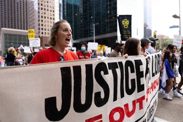 July 11, 2026, Houston, Texas, USA: Protesters march in Downtown Houston to protest against U.S. Immigration and Customs Enforcement (ICE) after Lorenzo Salgado Araujo was fatally shot by an ICE agent during an attempted immigration enforcement operation, an incident that has prompted calls from community leaders and elected officials for an independent investigation, Saturday, July 11, in Houston, Texas. Houston USA  - ZUMAg287 20260711_zsp_g287_085 Copyright: xMatthewxGuzmanx