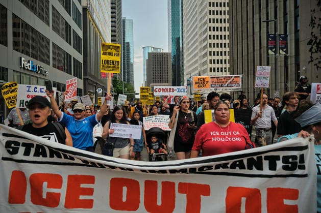 July 11, 2026, Houston, Texas, USA: Demonstrators march from Houston City Hall through downtown on July 11, 2026, demanding an independent investigation into the death of Lorenzo Salgado Araujo, a 52-year-old Mexican national fatally shot by a U.S. Immigration and Customs Enforcement agent in Houston on July 7. The protest was organized by the Party for Socialism and Liberation Ã¢â‚¬ Houston. Houston USA  - ZUMAe130 20260711_znp_e130_010 Copyright: xCarlosxEscalonax