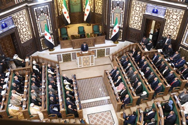 News Bilder des Tages Syria s New Parliament Holds Historic Inaugural Session Damascus, Syria - July 12, 2026: Syrian President Ahmed al-Sharaa speaks during the inaugural session of Syria s newly formed People s Assembly which marks the historic first parliament session held in Damascus since the ousting of former President Bashar al-Assad. Damascus Syria Copyright: xMohammadxBashirxAldaherx