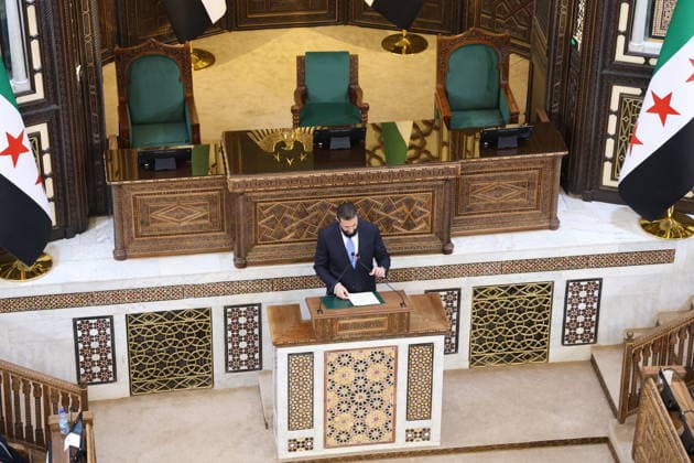 Syria s New Parliament Holds Historic Inaugural Session Damascus, Syria - July 12, 2026: Syrian President Ahmed al-Sharaa speaks during the inaugural session of Syria s newly formed People s Assembly which marks the historic first parliament session held in Damascus since the ousting of former President Bashar al-Assad. Damascus Syria Copyright: xMohammadxBashirxAldaherx