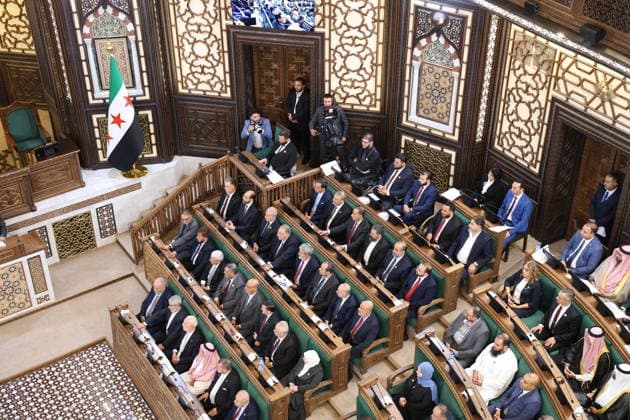 Syria s New Parliament Holds Historic Inaugural Session Damascus, Syria - July 12, 2026: Members of Syria s newly formed People s Assembly attend the body s inaugural session in Damascus representing the first parliament convention since the end of the rule of ousted Syrian President Bashar al-Assad. Damascus Syria Copyright: xMohammadxBashirxAldaherx