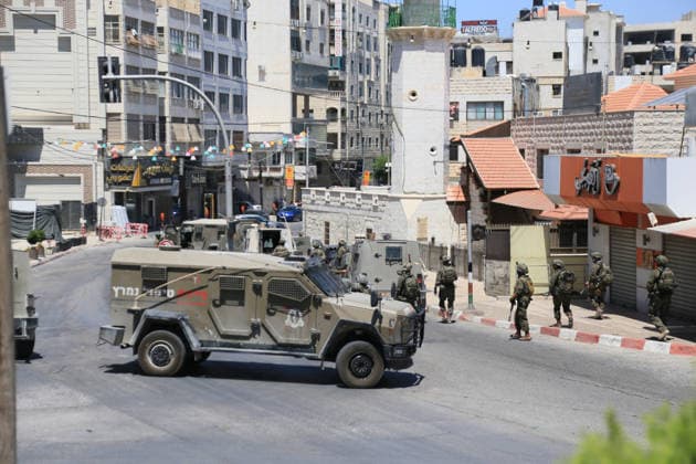 Israeli forces deploy during military operation in Nablus Israeli military vehicles and soldiers are deployed in the streets during a military operation targeting the West Bank city of Nablus, on July 12, 2026. Israeli forces raided several neighborhoods in the western part of the city during the operation. Photo by Mohammed Nasser apaimages Nablus West Bank Palestinian Territory 120726_Nablus_MN_00(11) Copyright: xapaimagesxMohammedxNasserx xapaimagesx