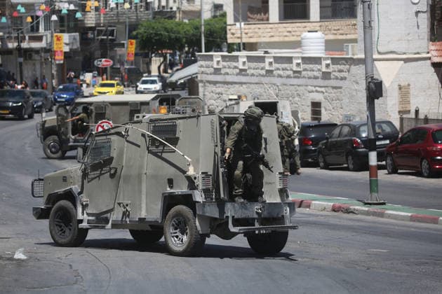 Israeli forces deploy during military operation in Nablus Israeli military vehicles and soldiers are deployed in the streets during a military operation targeting the West Bank city of Nablus, on July 12, 2026. Israeli forces raided several neighborhoods in the western part of the city during the operation. Photo by Mohammed Nasser apaimages Nablus West Bank Palestinian Territory 120726_Nablus_MN_00(7) Copyright: xapaimagesxMohammedxNasserx xapaimagesx