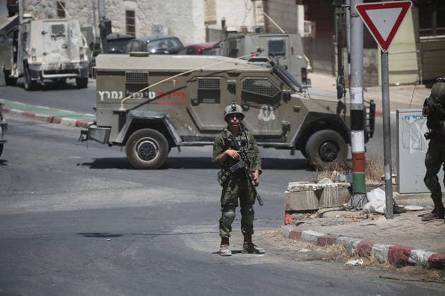 Israeli forces deploy during military operation in Nablus Israeli military vehicles and soldiers are deployed in the streets during a military operation targeting the West Bank city of Nablus, on July 12, 2026. Israeli forces raided several neighborhoods in the western part of the city during the operation. Photo by Mohammed Nasser apaimages Nablus West Bank Palestinian Territory 120726_Nablus_MN_00(5) Copyright: xapaimagesxMohammedxNasserx xapaimagesx