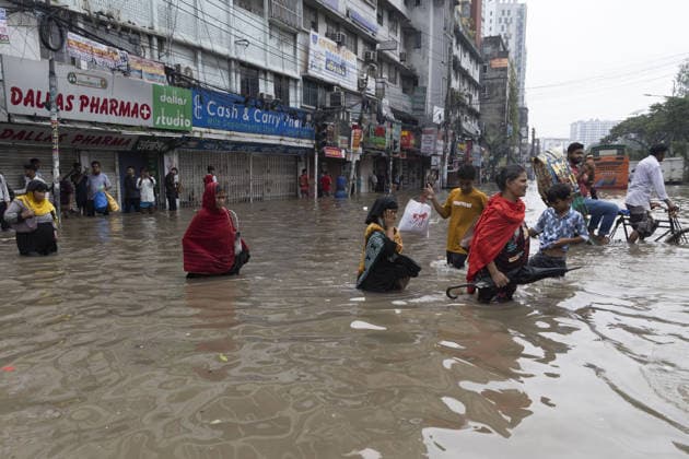 Persistent rain leaves Dhaka waterlogged, disrupting daily life DHAKA, BANGLADESH - JULY 12: Continuous heavy rainfall over the past several days has caused widespread waterlogging across different parts of the capital, Dhaka, Bangladesh on July 12, 2026. Flooded roads, residential neighborhoods, and commercial areas have disrupted the daily lives of residents, with day laborers, pedestrians, schoolchildren, and families among those most affected. Waterlogged streets have severely hampered the movement of private vehicles and other transport, while the ground floors and entrances of many buildings have been inundated. Stray dogs have also struggled to navigate the flooded streets. The prolonged rainfall has significantly disrupted normal li  Copyright: x2026xAnadoluxAbdulxGonix
