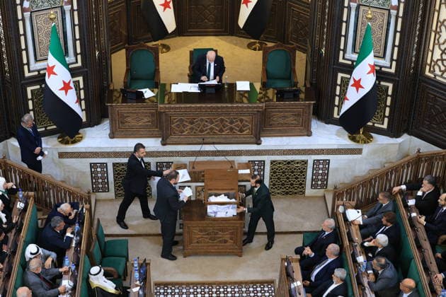Syrian Parliament Members Vote for New Speaker in the Presence of President Ahmed al-Sharaa Damascus, Syria - July 12, 2026: Members of Syria s newly formed People s Assembly cast their votes to elect the speaker of the parliament during the historic inaugural session held in the presence of Syrian President Ahmed al-Sharaa for the first time since the fall of the Bashar al-Assad regime. Damascus Syria Copyright: xMohammadxBashirxAldaherx
