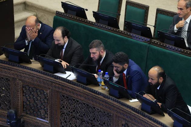 Syrian Parliament Members Vote for New Speaker in the Presence of President Ahmed al-Sharaa Damascus, Syria - July 12, 2026: Members of Syria s newly formed People s Assembly cast their votes to elect the speaker of the parliament during the historic inaugural session held in the presence of Syrian President Ahmed al-Sharaa for the first time since the fall of the Bashar al-Assad regime. Damascus Syria Copyright: xMohammadxBashirxAldaherx