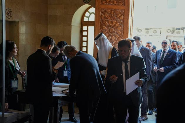 Damascus Syria Parliament First Session Members of Syria s People s Assembly check documents before the first session of the country s new parliament in Damascus, Syria, on July 12, 2026. The 210-member assembly is Syria s first parliament since the fall of the Assad government in December 2024 and is tasked with legislating during the transitional period. Damascus Damascus Syria Copyright: xOmarxAlbamx
