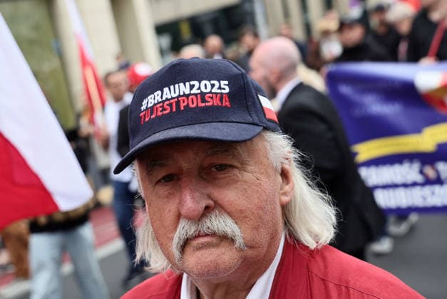 The Volhynia March in Warsaw Photo: Anita Walczewska East News, The Volhynia March, organized by the far-right Confederation of the Polish Crown and led by MP Grzegorz Braun, on July 12th 2026, in Warsaw, Poland. The 2026 demonstrations are occurring against a backdrop of increased diplomatic tension between Warsaw and Kyiv over the commemoration of the UPA (Ukrainian Insurgent Army), the organization responsible for the Volhynia massacre. The march had a largely anti-Ukrainian tone. Pictured: A man wearing a cap that reads: ?Braun2025, This is Poland.? EN_01680833_0099 