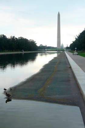 July 12, 2026, Washington, District Of Columbia, U.S: The Lincoln Memorial Reflecting Pool on the National Mall in Washington, DC is once again being drained, in advance of repair work. Seen here, the reflecting pool partial drained with the Washington Monument and Capitol Building in the background. Washington U.S - ZUMAg228 20260712_zap_g228_003 Copyright: xEvanxGolubx