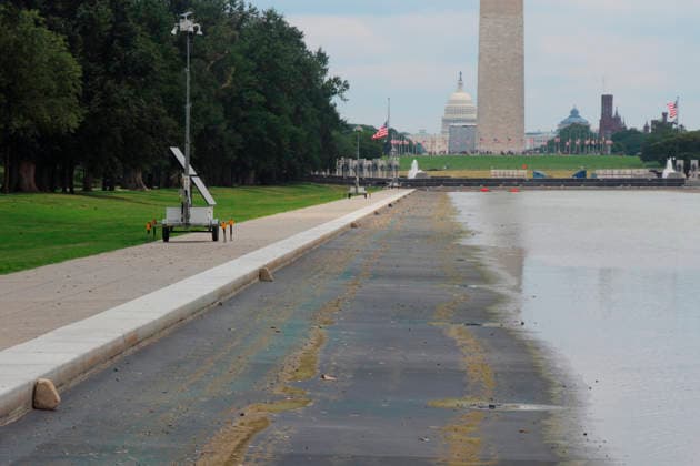 July 12, 2026, Washington, District Of Columbia, U.S: The Lincoln Memorial Reflecting Pool on the National Mall in Washington, DC is once again being drained, in advance of repair work. Seen here, the reflecting pool partial drained with the Washington Monument and Capitol Building in the background. Washington U.S - ZUMAg228 20260712_zap_g228_007 Copyright: xEvanxGolubx