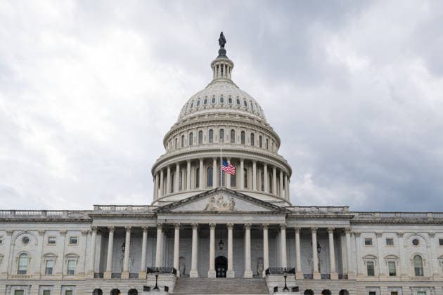 July 12, 2026, Washington, District Of Columbia, United States: U.S. flags fly at half-staff atop the U.S. Capitol following the death of Senator LINDSEY GRAHAM. Washington United States - ZUMAk206 20260712_znp_k206_001 Copyright: xMattxKaminskyx