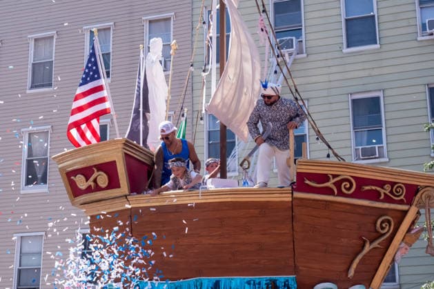 July 12, 2026, New York, New York, USA: A 4-ton replica of a boat is paraded down the street as a young boy tosses confetti from it...The Ã¢â‚¬oeDancing of the GiglioÃ¢â‚¬Â is an annual event, held in Williamsburg, Brooklyn in front of Our Lady of Mount Carmel. The Italian community takes part in a 139 year old tradiontion celebration heritage, faith and culture. New York USA - ZUMAp288 20260712_znp_p288_012 Copyright: xSyndixPilarx