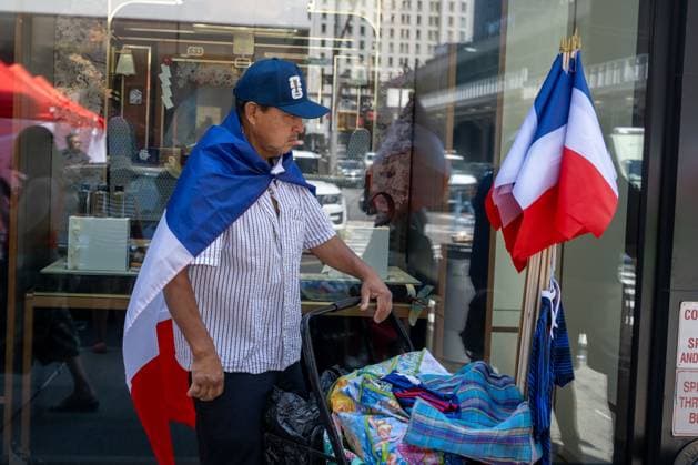 RECORD DATE NOT STATED People celebrate Bastille Day in New York (NEW) People celebrate Bastille Day in New York. July 12, 2026, New York, New York, USA: A man sales French flags during the annual Bastille Day celebration on Madison Avenue, on July 12, 2026 in New York City. (Credit: M10s TheNews2)(Foto: M10S Thenews2 imago images) People celebrate Bastille Day in New York  Copyright: xM10sx