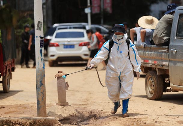 GUIGANG, CHINA - JULY 12: A worker conducts disinfection operations on July 12, 2026 in Guigang, Guangxi Zhuang Autonomous Region of China. Floodwaters have receded in the area, prompting immediate cleaning and sanitation efforts.  Copyright: xVCGx 111653887798