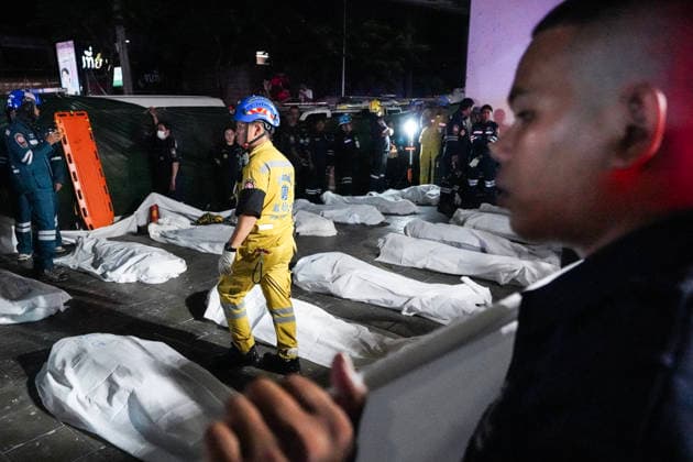 Bangkok Pub Fire Kills At Least 27 People Members of emergency personnel work next to covered bodies at the site of a fire at a pub in Bangkok, Thailand, on July 13, 2026. A large fire engulfs a pub in Bangkok early on Monday morning local time, resulting in at least 27 fatalities before firefighters bring the blaze under control, according to officials. Bangkok Bangkok Thailand  Copyright: xAnusakxLaowilasx originalFilename: laowilas-notitle260713_npmf9.jpg