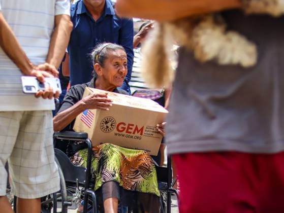 Aid organization distributes relief supplies in La Guaira LA GUAIRA, VENEZUELA JULY 13, 2026: Volunteers from Global Empowerment Mission (GEM) distribute non-perishable food, bottled water and essential relief supplies to residents of Naiguata parish in La Guaira state, Venezuela, following the recent earthquake that affected the region. Humanitarian assistance continues as communities recover from the disaster. La Guaira Venezuela (Bolivarian Republic of) Copyright: x xmarioxfloresx xJNAxPressx