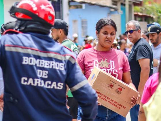 Aid organization distributes relief supplies in La Guaira LA GUAIRA, VENEZUELA JULY 13, 2026: Volunteers from Global Empowerment Mission (GEM) distribute non-perishable food, bottled water and essential relief supplies to residents of Naiguata parish in La Guaira state, Venezuela, following the recent earthquake that affected the region. Humanitarian assistance continues as communities recover from the disaster. La Guaira Venezuela (Bolivarian Republic of) Copyright: x xmarioxfloresx xJNAxPressx
