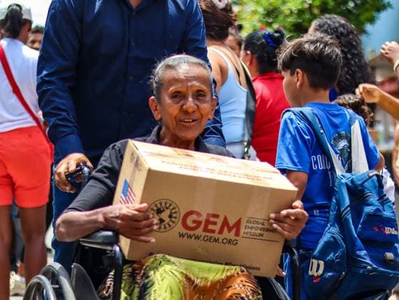 Aid organization distributes relief supplies in La Guaira LA GUAIRA, VENEZUELA JULY 13, 2026: Volunteers from Global Empowerment Mission (GEM) distribute non-perishable food, bottled water and essential relief supplies to residents of Naiguata parish in La Guaira state, Venezuela, following the recent earthquake that affected the region. Humanitarian assistance continues as communities recover from the disaster. La Guaira Venezuela (Bolivarian Republic of) Copyright: x xmarioxfloresx xJNAxPressx