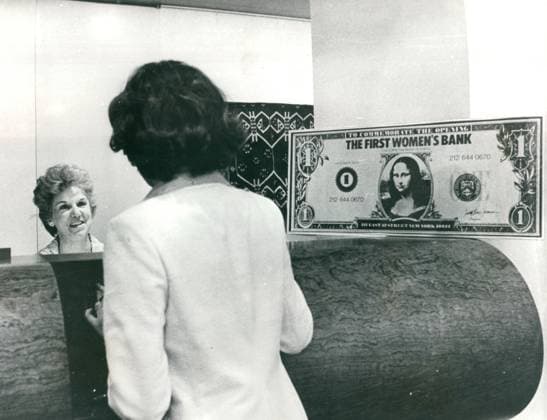 A teller takes care of a customer at the Women s Bank of the State of New York A teller takes care of a customer at the Women s Bank of the State of New York Copyright: PeterxLxGould 1072_05_Sub04648_47661_H_00074A