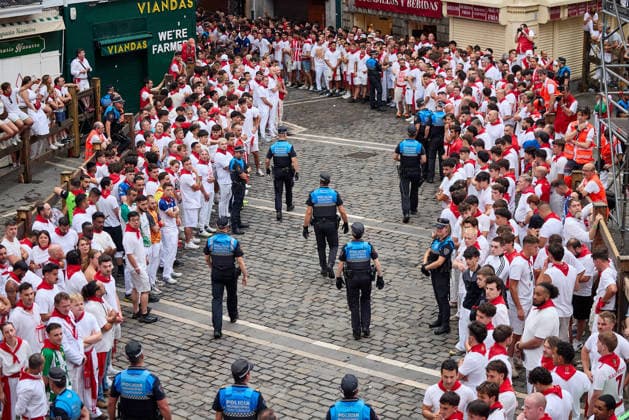 July 13, 2026, Pamplona, Navarre, Spain: People take part in the traditional encierro (bull-run) of the San Fermin Festival in Pamplona, Spain on July 13, 2026. The bull-running fiesta is held annually from 06 to 14 July in commemoration of the city s patron saint. Visitors from all over the world attend the festival. Many of them physically participate in the highlight event - the running of the bulls, or encierro - where they attempt to outrun the animals along a route through the narrow streets of Pamplona s old city. Pamplona Spain - ZUMAa206 20260713_zsp_a206_001 Copyright: xRubenxAlbarranx