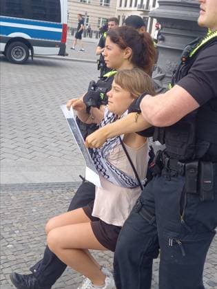 Greta Thunberg detained during Peacefully Against Genocide protest in Berlin BERLIN, GERMANY - JULY 13: (----EDITORIAL USE ONLY - MANDATORY CREDIT - PEACEFULLY AGAINST GENOCIDE HANDOUT - NO MARKETING NO ADVERTISING CAMPAIGNS - DISTRIBUTED AS A SERVICE TO CLIENTS----)Activist Greta Thunberg is detained during Peacefully Against Genocide protest against the production of weapons destined for Palestine and Lebanon as people gather in front of the offices of the arms manufacturer Rheinmetall near the Brandenburg Gate in Berlin, Germany on July 13, 2026. Peacefully Against Genocide Anadolu Berlin Germany. Editorial use only. Please get in touch for any other usage.  Copyright: x2026xAnadoluxPeacefullyxAgainstxGenocidex
