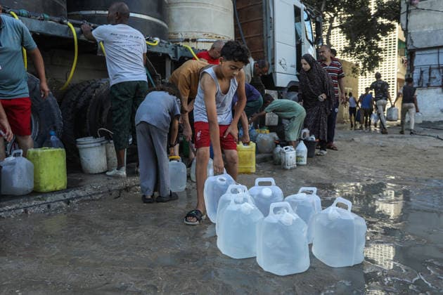 Clean water distribution continues during water crisis in Khan Yunis KHAN YUNIS, GAZA, PALESTINE - JULY 13: Palestinians fill containers with clean water distributed via a supply tanker as water crisis is underway due to severe damage to infrastructure and water wells caused by Israeli attacks in Khan Yunis, Gaza, Palestine on July 13, 2026. Abed Rahim Khatib Anadolu Khan Yunis Gaza. Editorial use only. Please get in touch for any other usage.  Copyright: x2026xAnadoluxAbedxRahimxKhatibx