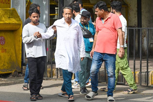 NEW DELHI, INDIA - JULY 13: Activist Sonam Wangchuk escorted by supporters when returning from the washroom as he continues his indefinite hunger strike for the sixteenth consecutive day in solidarity with the protest by Cockroach Janta Party demanding the immediate resignation of Union Education Minister Dharmendra Pradhan following paper leak irregularities during the national NEET-UG 2026 medical entrance examinations, at Janatar Mantar on July 13, 2026 in New Delhi, India. (Photo by Vipin Kumar Hindustan Times) Activist Sonam Wangchuk Continues His Indefinite Hunger Strike At Jantar Mantar For 16th Day