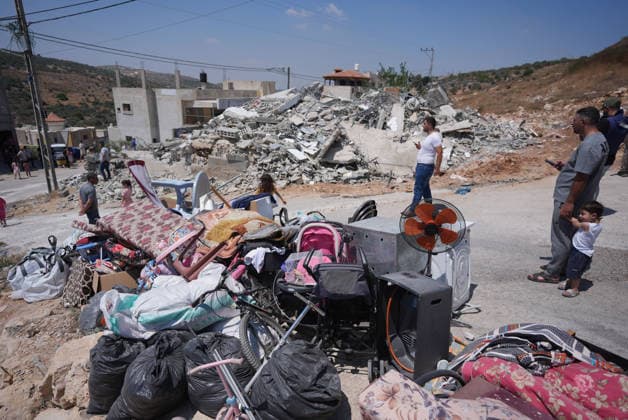 Israel demolishes Palestinian home in the West Bank SALFIT, WEST BANK, PALESTINE - JULY 13: A view of household belongings as Israeli forces demolish the home of Palestinian Hasan al-Rinawi with a bulldozer and heavy machinery alleging it was built without a permit in the village of Kufr al Dik, west of Salfit in the West Bank, Palestine, on July 13, 2026. Issam Rimawi Anadolu Salfit West Bank. Editorial use only. Please get in touch for any other usage.  Copyright: x2026xAnadoluxIssamxRimawix