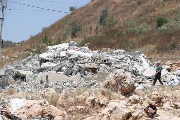 Israel demolishes Palestinian home in the West Bank SALFIT, WEST BANK, PALESTINE - JULY 13: Israeli forces demolish the home of Palestinian Hasan al-Rinawi with a bulldozer and heavy machinery alleging it was built without a permit in the village of Kufr al Dik, west of Salfit in the West Bank, Palestine, on July 13, 2026. Issam Rimawi Anadolu Salfit West Bank. Editorial use only. Please get in touch for any other usage.  Copyright: x2026xAnadoluxIssamxRimawix