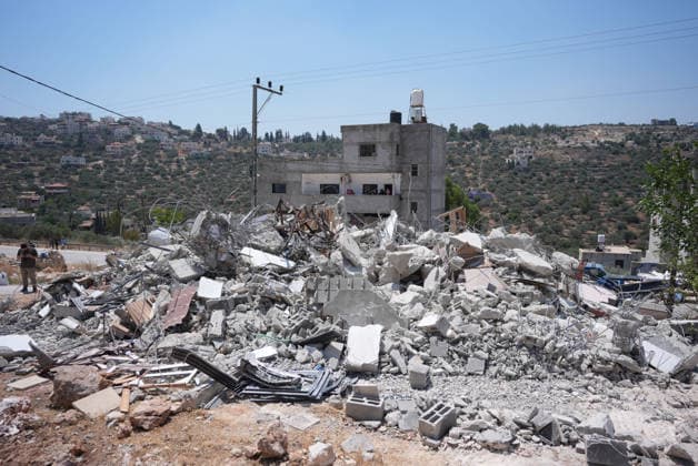 Israel demolishes Palestinian home in the West Bank SALFIT, WEST BANK, PALESTINE - JULY 13: Israeli forces demolish the home of Palestinian Hasan al-Rinawi with a bulldozer and heavy machinery alleging it was built without a permit in the village of Kufr al Dik, west of Salfit in the West Bank, Palestine, on July 13, 2026. Issam Rimawi Anadolu Salfit West Bank. Editorial use only. Please get in touch for any other usage.  Copyright: x2026xAnadoluxIssamxRimawix